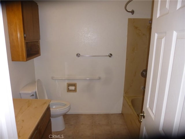 full bathroom featuring bathtub / shower combination, toilet, vanity, baseboards, and tile patterned floors