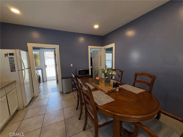 1375 E 46th St, Los Angeles, CA 90011 - dining area featuring recessed lighting, light tile patterned floors, washer / dryer, and baseboards