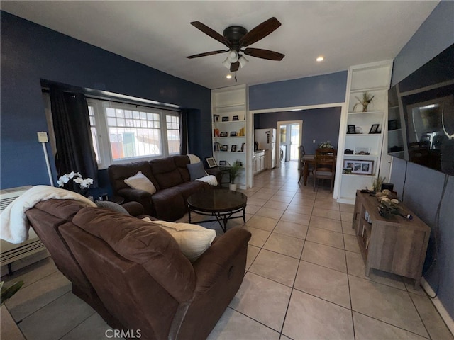 1375 E 46th St, Los Angeles, CA 90011 - living area with built in features, a wealth of natural light, and a ceiling fan