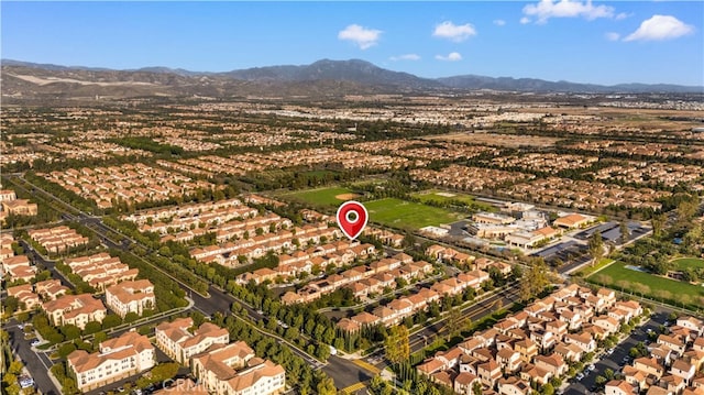 bird's eye view with a residential view and a mountain view