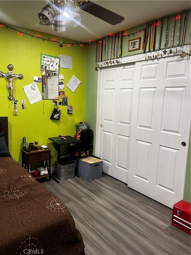 bedroom with wood finished floors