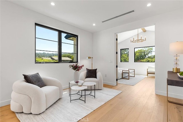 4435 Katherine Ave, Sherman Oaks, CA 91423 - living area with recessed lighting, lofted ceiling, an inviting chandelier, light wood-type flooring, and baseboards
