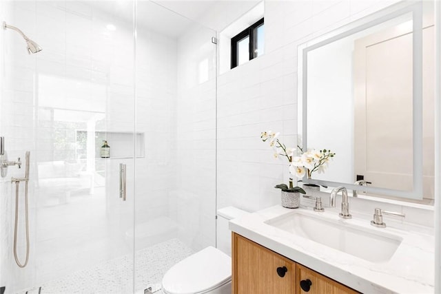 4435 Katherine Ave, Sherman Oaks, CA 91423 - bathroom featuring vanity, toilet, and a stall shower