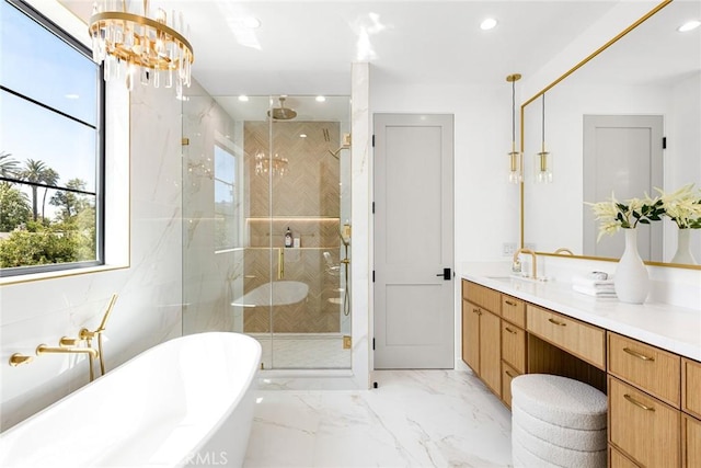 4435 Katherine Ave, Sherman Oaks, CA 91423 - full bath featuring marble finish floor, an inviting chandelier, a freestanding bath, vanity, and a stall shower