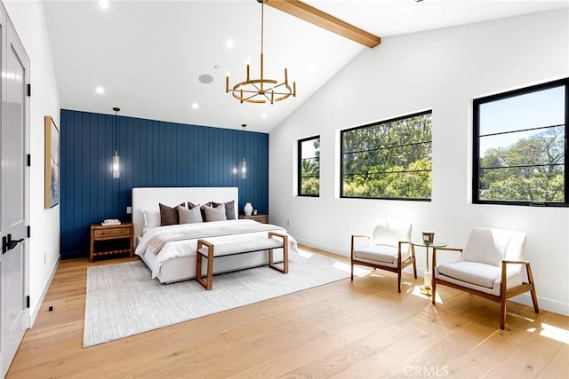 4435 Katherine Ave, Sherman Oaks, CA 91423 - bedroom featuring a chandelier, light wood-style flooring, beam ceiling, and baseboards