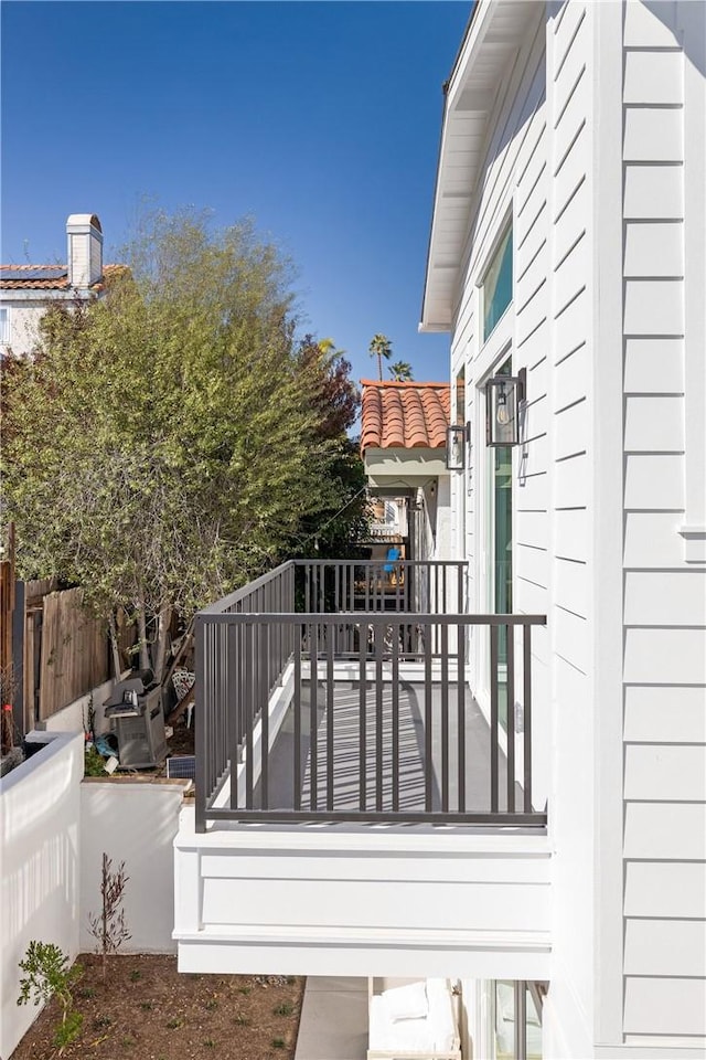 wooden deck featuring fence