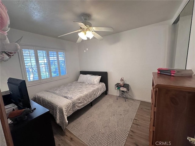 33518 Colorado St, Yucaipa, CA 92399 - bedroom with ceiling fan, baseboards, and wood finished floors