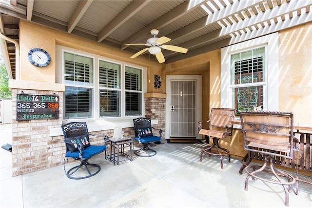 view of patio / terrace with a ceiling fan