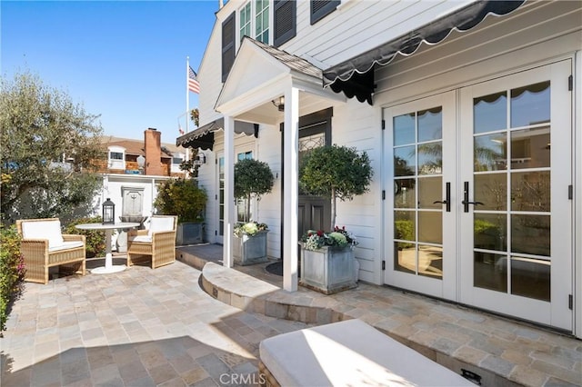 view of patio featuring french doors