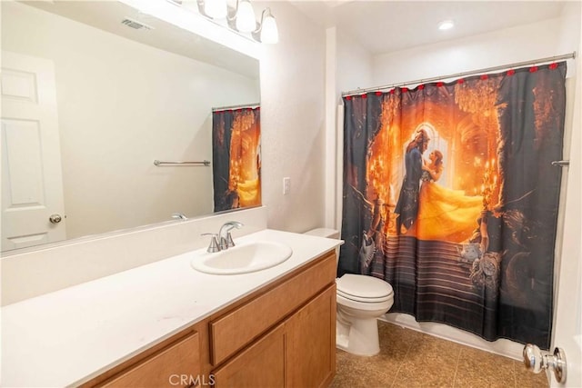 bathroom with tile patterned flooring, toilet, visible vents, vanity, and a shower with curtain