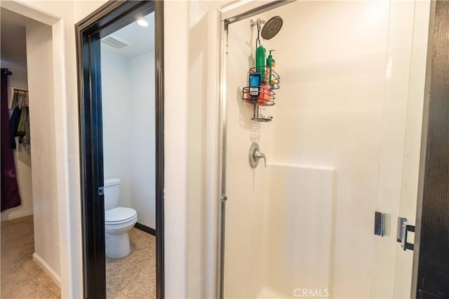 full bathroom with baseboards, visible vents, a shower stall, and toilet