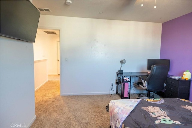 bedroom featuring light colored carpet, visible vents, and baseboards