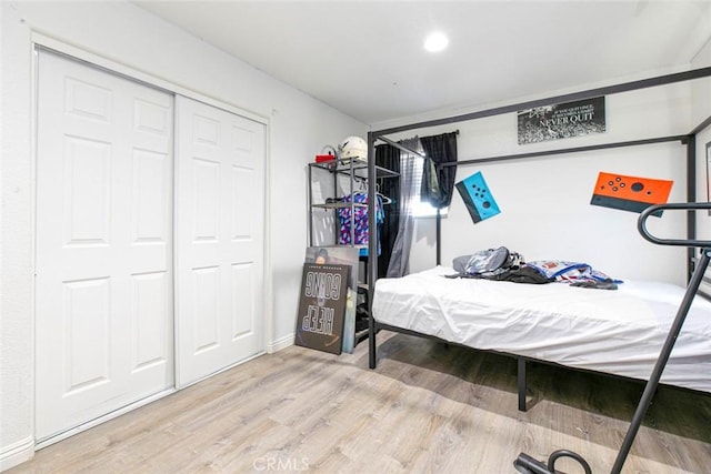 bedroom with wood finished floors