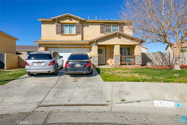 traditional home featuring a garage, a tile roof, fence, driveway, and stucco siding