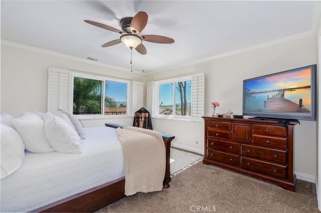 bedroom featuring light carpet, visible vents, baseboards, and crown molding