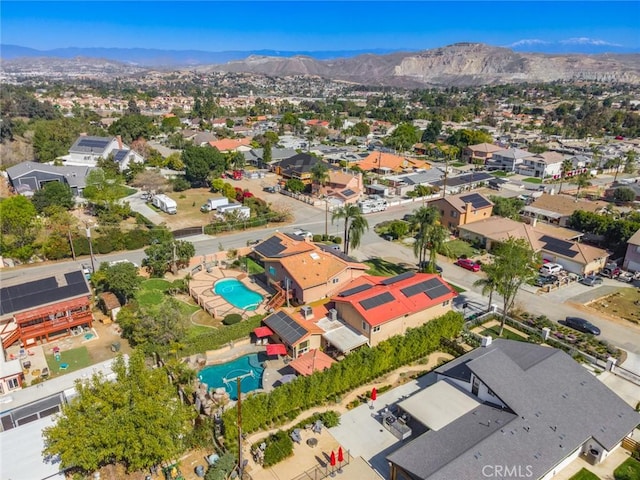 aerial view featuring a residential view and a mountain view