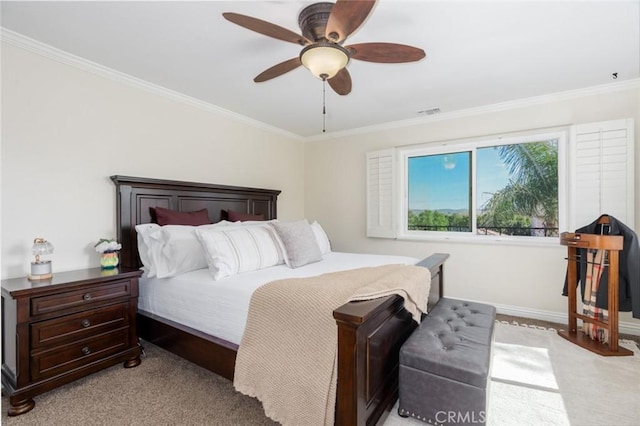 bedroom featuring a ceiling fan, visible vents, crown molding, and light colored carpet