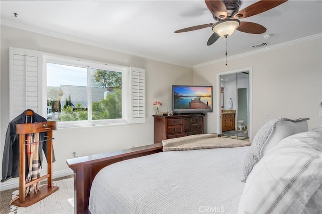 bedroom featuring visible vents, connected bathroom, ceiling fan, ornamental molding, and wood finished floors