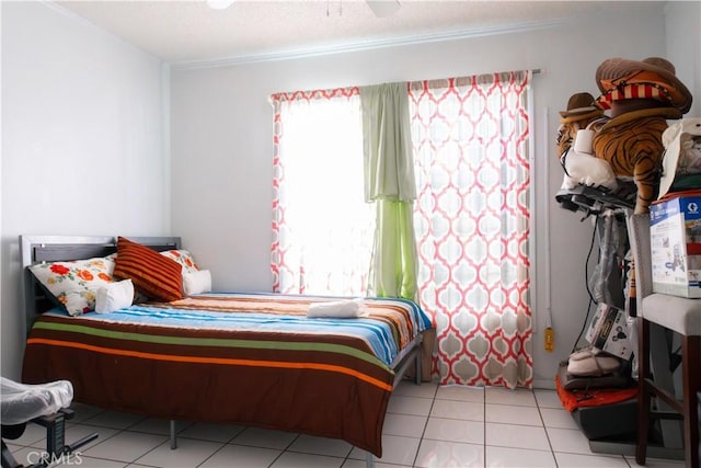 bedroom featuring light tile patterned floors