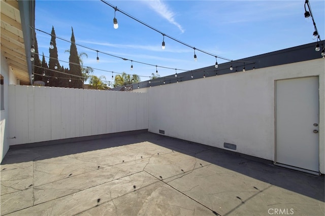 view of patio / terrace with fence