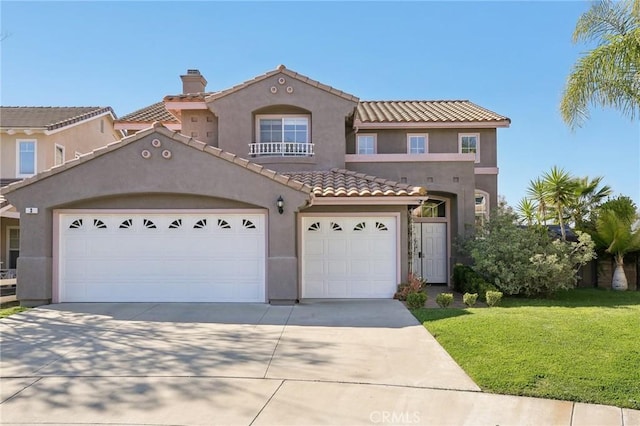 mediterranean / spanish-style house featuring driveway, a chimney, and stucco siding