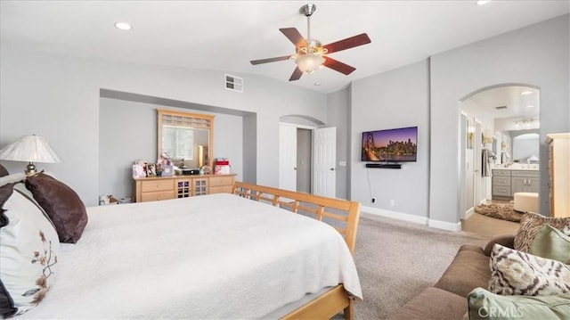 bedroom featuring visible vents, recessed lighting, arched walkways, carpet, and baseboards