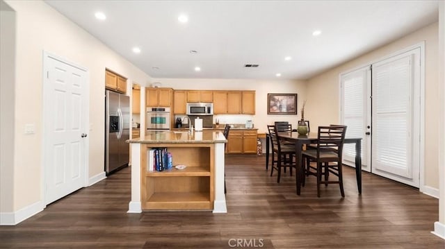 kitchen with dark wood-type flooring, open shelves, recessed lighting, and appliances with stainless steel finishes