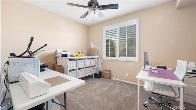 office with baseboards, carpet floors, and a ceiling fan