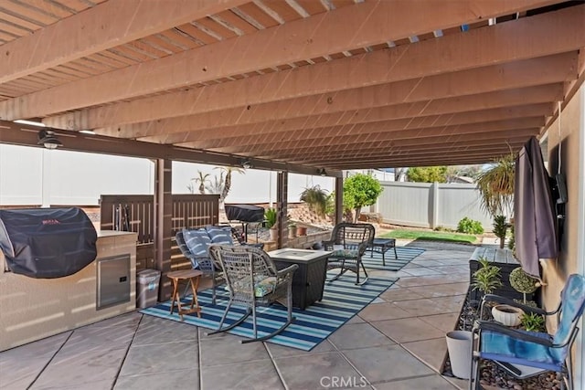 view of patio / terrace featuring fence