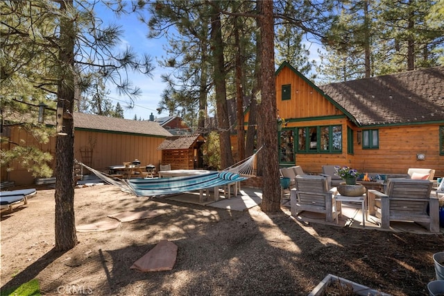 view of yard with an outdoor hangout area and a patio