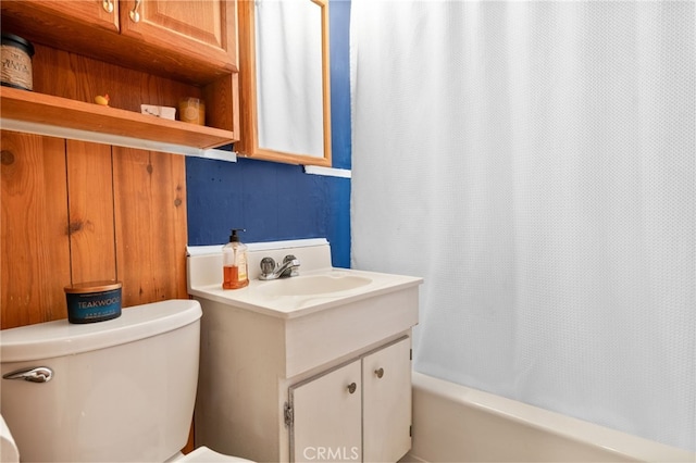 full bathroom with vanity and toilet