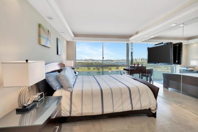 tiled bedroom with floor to ceiling windows