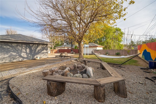 view of yard with central AC and a fenced backyard