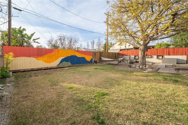 view of yard featuring a fenced backyard