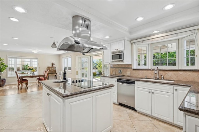 1632 Indus St, Newport Beach, CA 92660 - kitchen with stainless steel appliances, island range hood, a sink, crown molding, and light tile patterned flooring