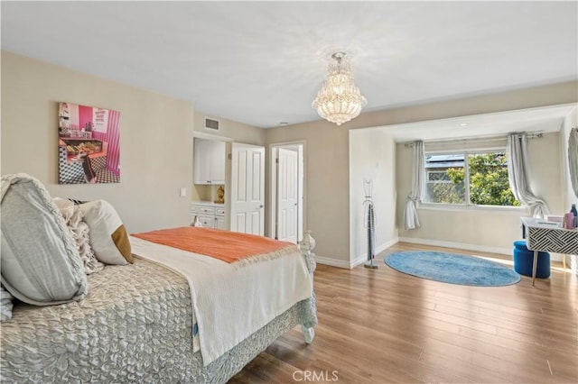 1632 Indus St, Newport Beach, CA 92660 - bedroom featuring a chandelier, baseboards, and wood finished floors