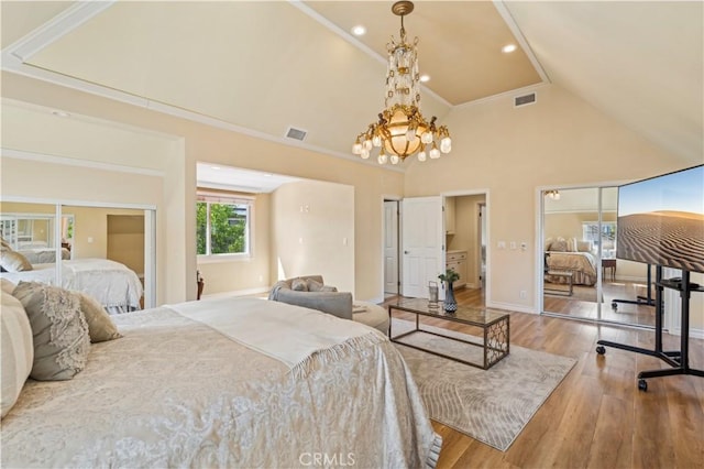 1632 Indus St, Newport Beach, CA 92660 - bedroom featuring wood finished floors, two closets, a chandelier, baseboards, and high vaulted ceiling