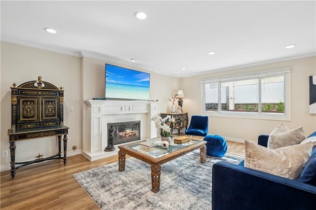 1632 Indus St, Newport Beach, CA 92660 - living area with wood finished floors, crown molding, a glass covered fireplace, and recessed lighting