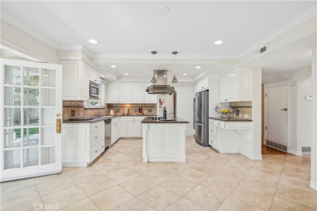 1632 Indus St, Newport Beach, CA 92660 - kitchen with dark countertops, stainless steel appliances, range hood, decorative backsplash, and recessed lighting