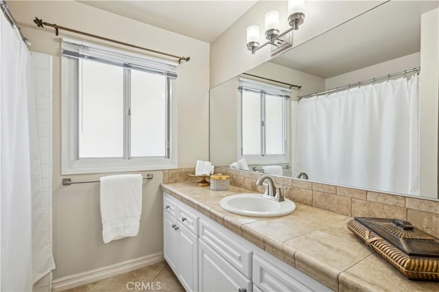 1632 Indus St, Newport Beach, CA 92660 - full bathroom with healthy amount of natural light, vanity, and tile patterned flooring