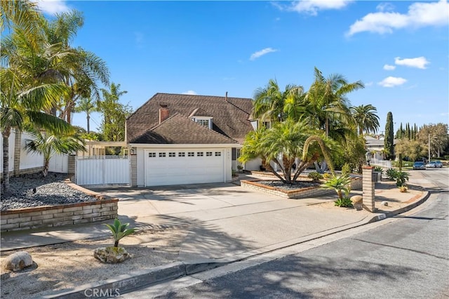 1632 Indus St, Newport Beach, CA 92660 - view of front of property with driveway and an attached garage