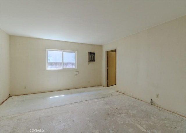 unfurnished room featuring a wall mounted air conditioner