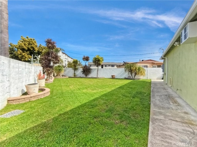 view of yard featuring a fenced backyard