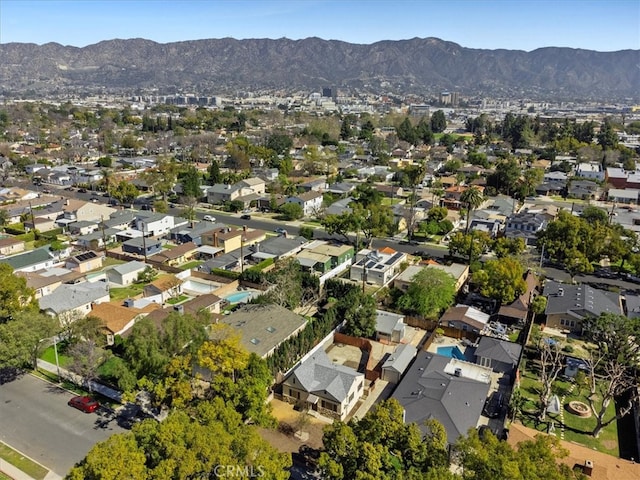 bird's eye view with a residential view and a mountain view