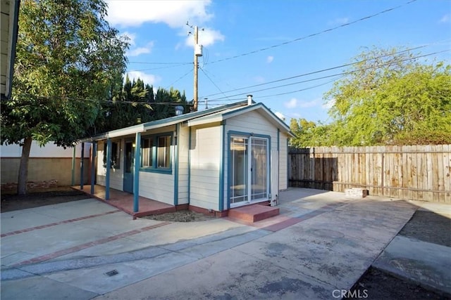 view of outdoor structure with a fenced backyard