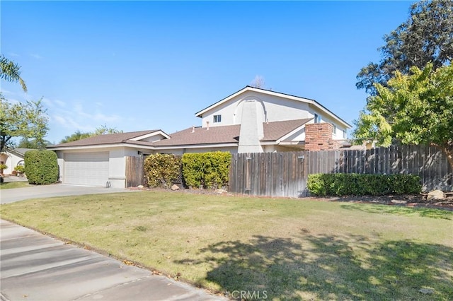 view of front of house featuring a garage, concrete driveway, fence, and stucco siding