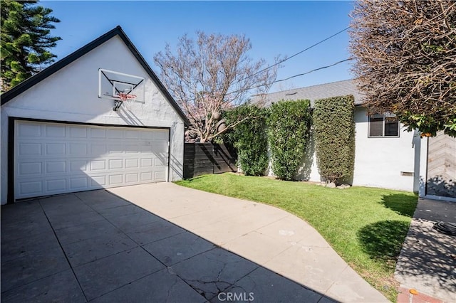 exterior space featuring fence and a lawn