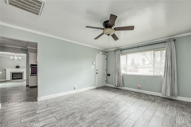 unfurnished room with baseboards, visible vents, ornamental molding, wood tiled floor, and ceiling fan with notable chandelier