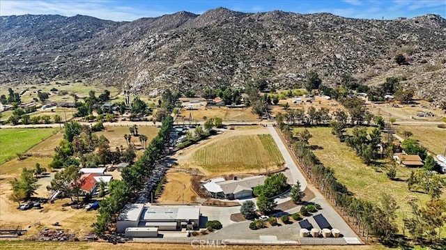 aerial view featuring a mountain view and a rural view