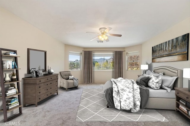 bedroom featuring carpet, visible vents, and ceiling fan